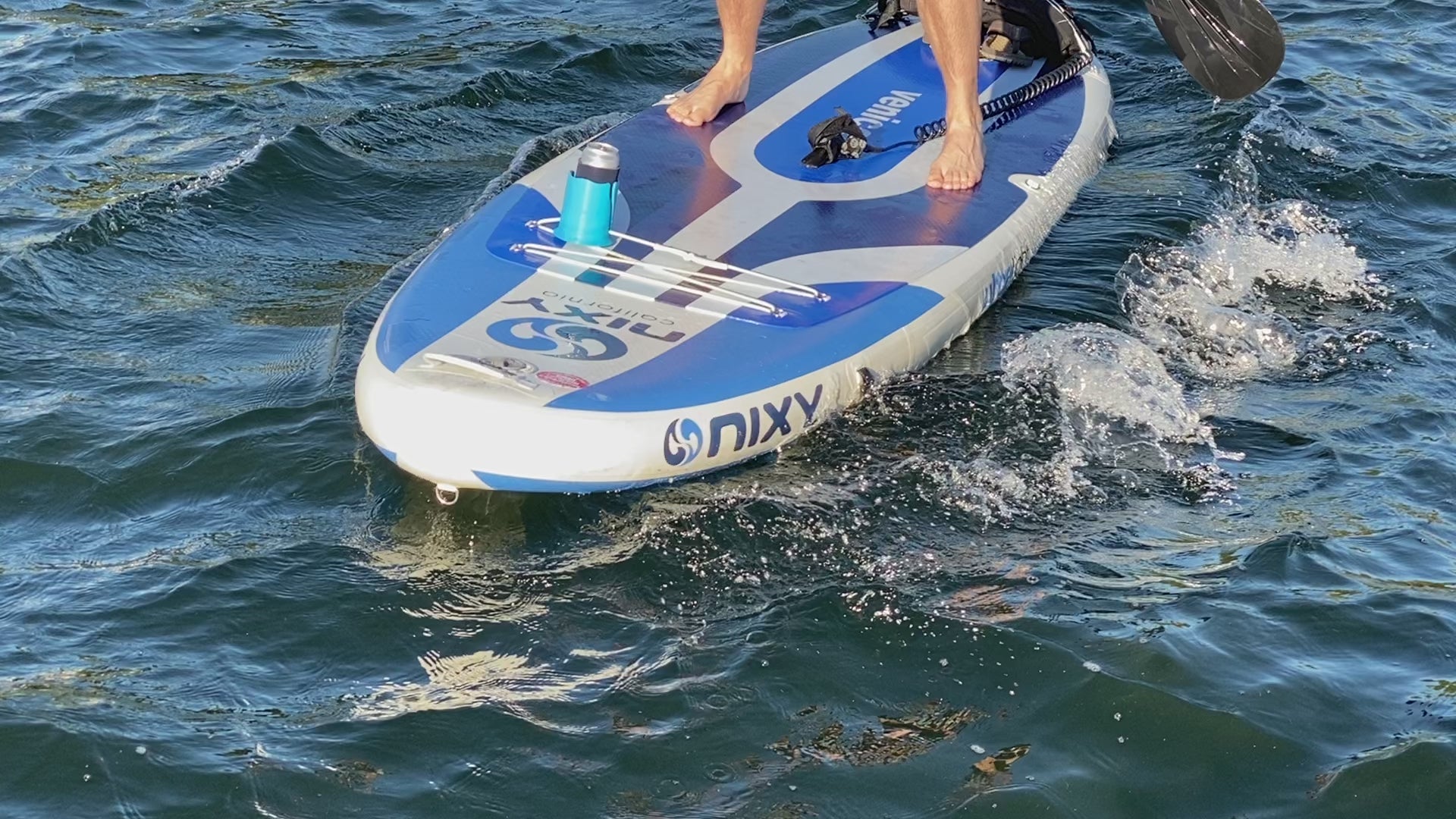 Video showing the Floatsup Cup attached to a paddle board with a drink can in it on rough water. Drink does not spill or tip over while in the cup. 